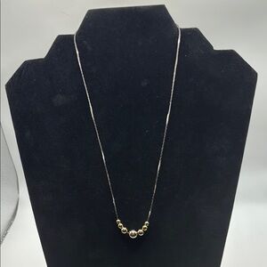 Elegant Silver and Gold Beaded Necklace